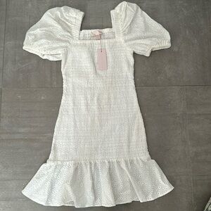 Boho Chic White Textured Dress with Flutter Sleeves and Ruffled Hem